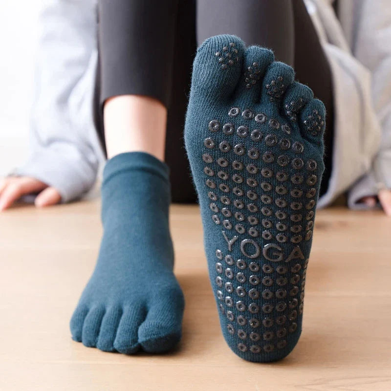 Five-toe Pilates socks compared with open-toe and crew coverage styles