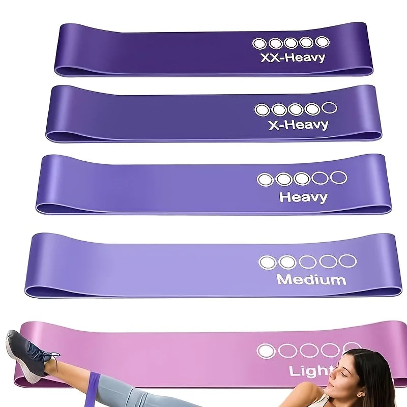 Color-coded Pilates resistance bands showing multiple tension levels for home practice