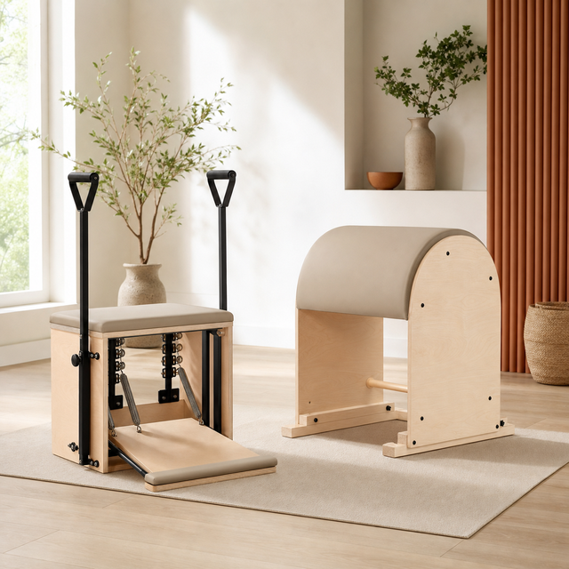 Pilates chair and barrel in a bright studio