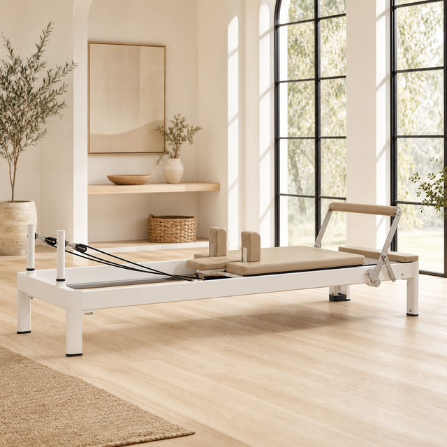 Pilates reformer in a bright home studio